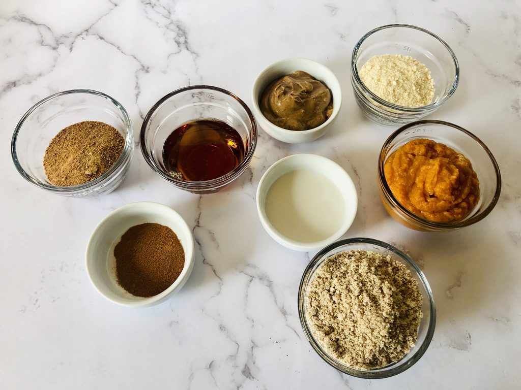 Ingredients for No-Bake Pumpkin Balls are shown on a countertop.